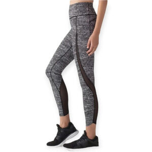 Lululemon Pace Perfect 25" Leggings with Mesh Cutouts in Air Time White Black 10